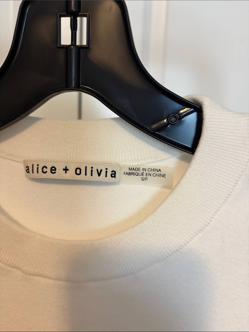 Alice + Olivia White Knit Top with Black Sleeve Stripes and cut outs - Picture 2 of 5